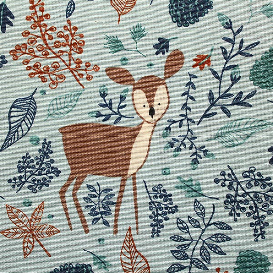 dekostoff in bleu mit motiven von bambi im wald